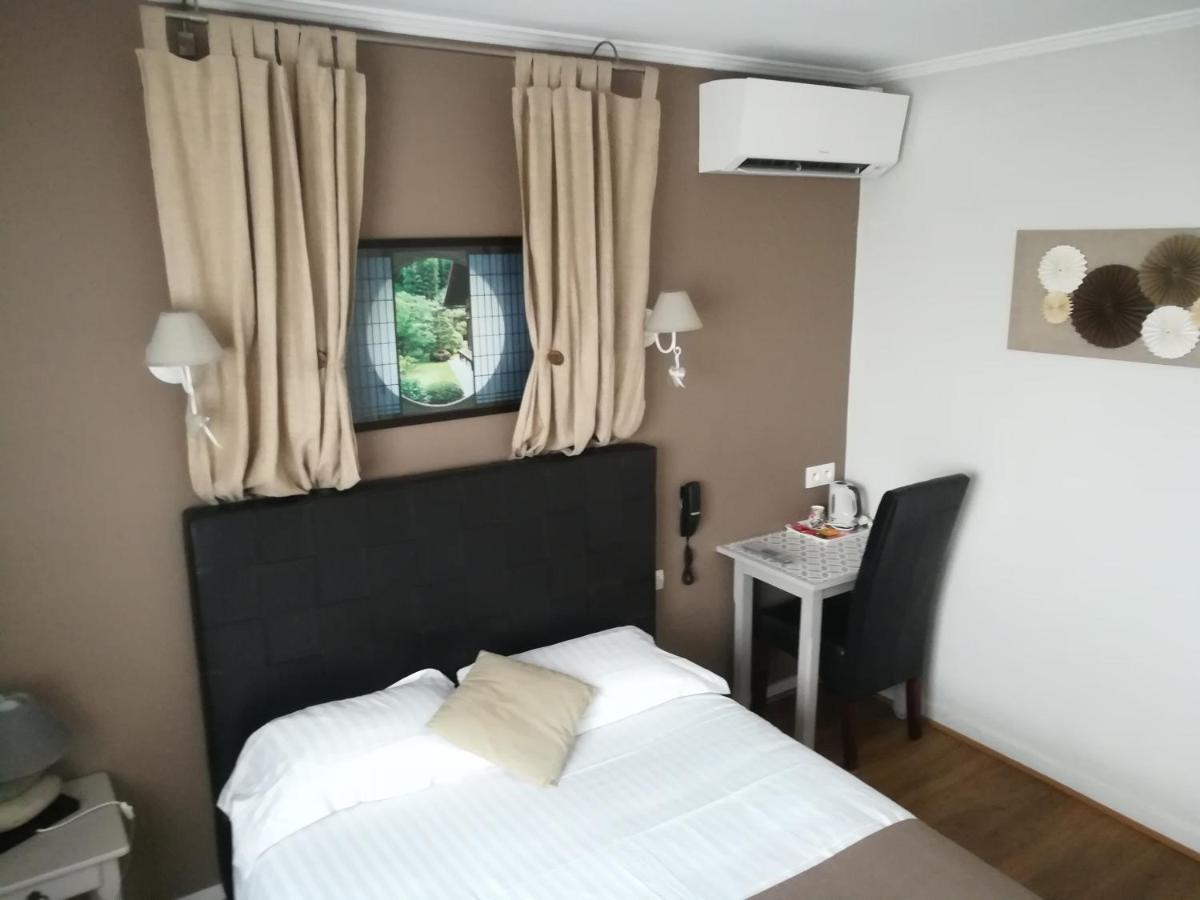 Contact Hotel Du Relais Thouars Bagian luar foto